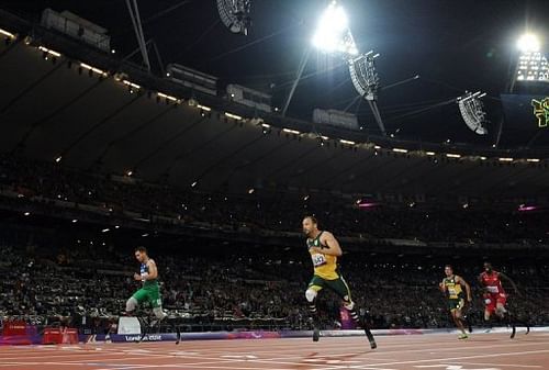 Brazil's Alan Oliveira (l) sensationally beats South Africa's Oscar Pistorius (C)