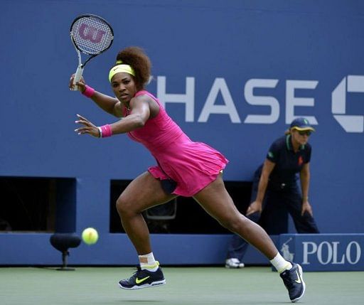 Serena Williams of the US returns the ball against Andrea Hlavackova of the Czech Republic