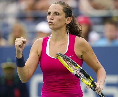 Roberta Vinci of Italy reacts to a point against Agnieszka Radwanska of Poland