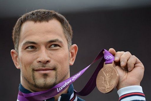 The IOC says it disqualified Koji Murofushi because his campaigning for the role broke the rules