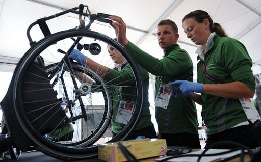 Technicians at the wheelchair orthotic and prosthetic repair centre