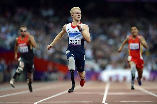 Britain&#039;s Jonnie Peacock powers home to win the men&#039;s 100m T44 heat 1