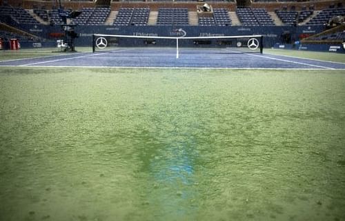 Rain falls on the Arthur Ashe Stadium