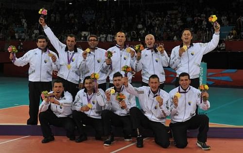 Bosnia's team pose on the podium with their gold medals