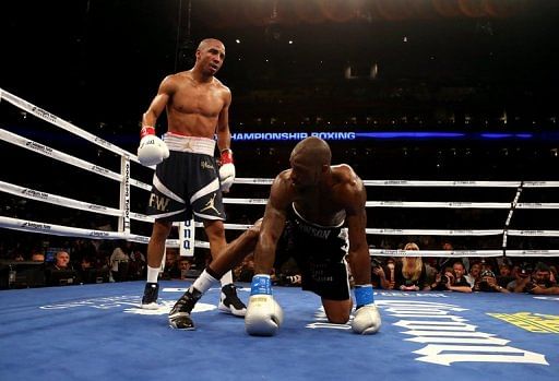 Andre Ward stopped Chad Dawson in the 10th round to remain unbeaten and retain his world title