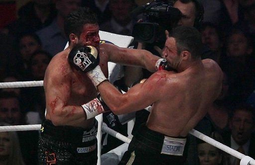 The fight came to an abrupt end in the 4th when a Klitschko left hook brought a gush of blood from above Charr&#039;s eye