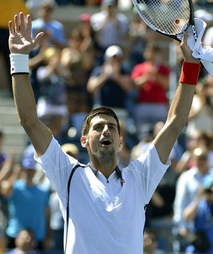 Novak Djokovic celebrates after winning