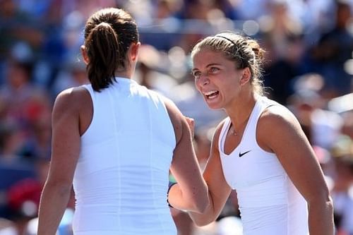 Sara Errani and Roberta Vinci of Italy react against Andrea Hlavackova and Lucie Hradecka of the Czech Republic