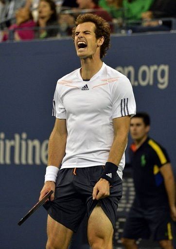 Murray held his nerve in a roller-coaster final, which witnessed a record-setting tie-breaker