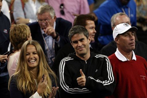 Kim Sears and Andy Ireland are unable to hide their delight, but Ivan Lendl (right) maintains a stoic face