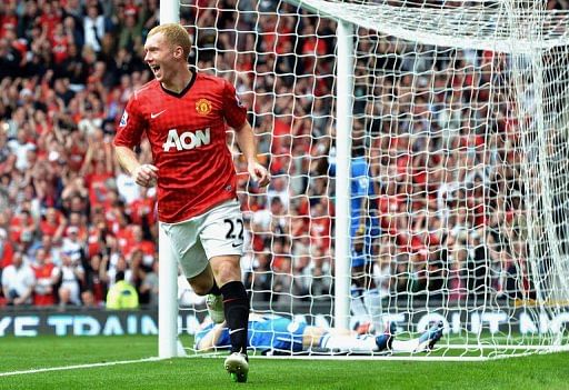 Scholes scores in landmark Premiership match as City held