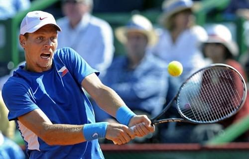 Czech Republic's tennis player Tomas Berdych returns the ball to Argentina's Carlos Berlocq