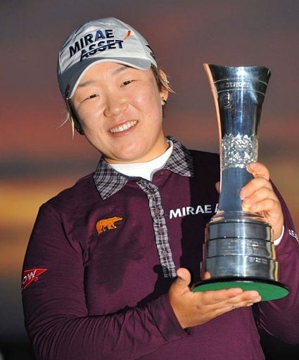 South Korea&#039;s Shin Jiyai poses for photographers after winning the Women&#039;s British Open