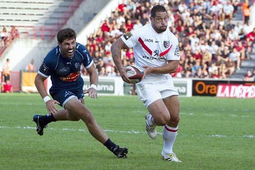 Perpignan&#039;s fly-half James Hook hits a penalty kick during the French Top14 rugby match Perpignan vs Bayonne