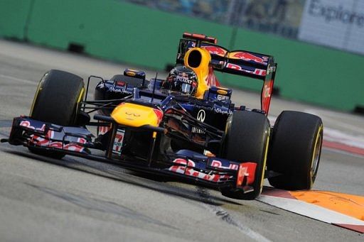 The Red Bull driver clocked 1min 47.947sec at dusk around the glittering street circuit