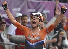 Dutchwoman Vos wins third gold in world road race