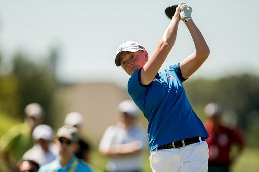 Stacy Lewis plays a tee shot at the third hole