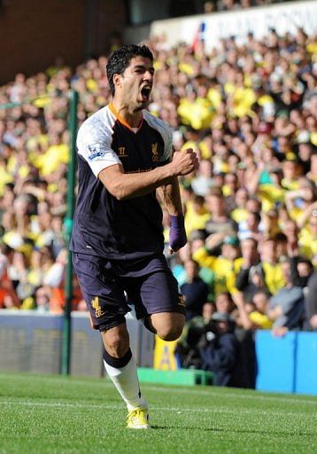 Liverpool&#039;s striker Luis Suarez celebrates scoring