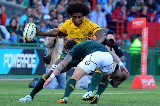 Australia&#039;s Radike Samo is tackled by South Africa&#039;s Francois Hougaard