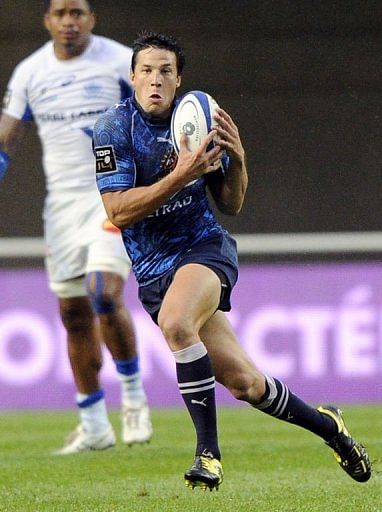 Montpellier&#039;s fly-half Fran&Atilde;&sect;ois Trinh Duc runs with the ball