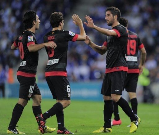 'Confident' Spurs eye further Greek tonic