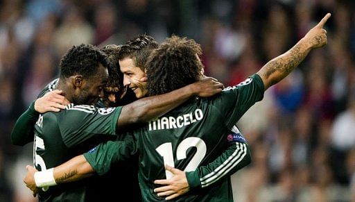 Real Madrid&#039;s Cristiano Ronaldo (2nd R) celebrates with teammates after scoring