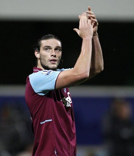 Andy Carroll acknowledges the crowd after helping West Ham beat Queens Park Rangers at Loftus Road on Monday