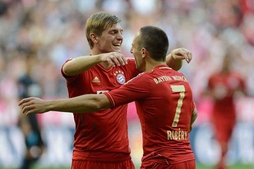Bayern Munich&#039;s Franck Ribery and Toni Kroos celebrate