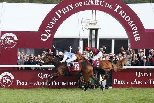 Orfevre (right), Japan&#039;s 2011 horse of the year, looked certain to claim his country&#039;s first victory in the race