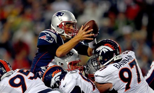 Buffalo Bills' Willis McGahee (21) is tackled by New England