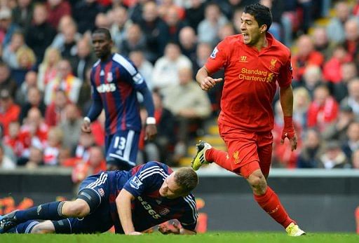 Rodgers backs Suarez after diving row