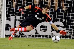 Casillas downplays Barca's eight-point advantage