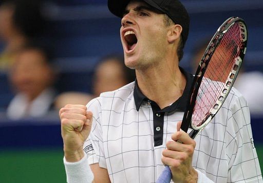 John Isner saved three match points before winning his second round match