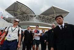 China blogger 'sorry' for Federer threat
