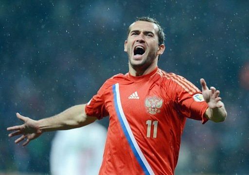 Russia&#039;s national football team player Aleksandr Kerzhakov celebrates scoring a goal