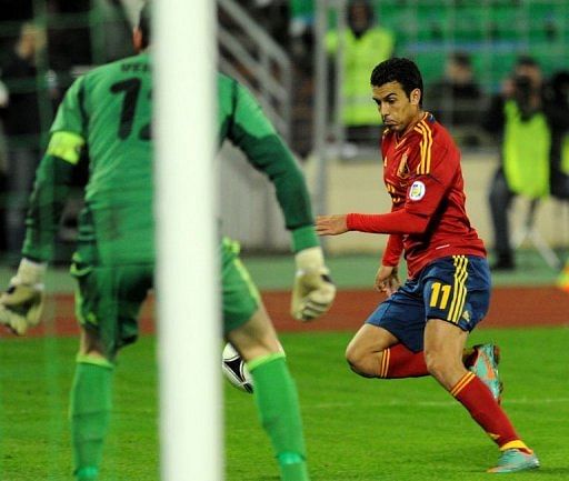 Spain&#039;s midfielder Pedro scoring a goal during the FIFA 2014 World Cup qualifying match against Belarus