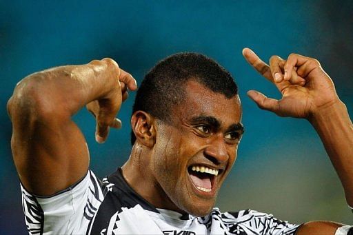 Fiji&#039;ss Apisai Raviyawa Domolailai celebrates his team&#039;s victory over New Zealand in the final