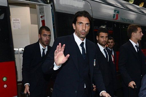 Italy goalkeeper and captain Gianluigi Buffon gets off a train at Milan Central Station on October 15