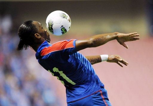 Drogba to return to Shanghai as salary row rumbles