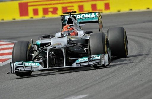 Michael Schumacher steers his car during the third practice session of the Formula One Korean Grand Prix in Yeongam