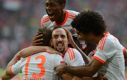 L-R: Bayern Munich players Rafinha, David Alaba, Franck Ribery and Dante celebrate after the fifth goal