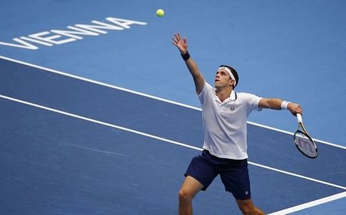 Luxembourg's Gilles Muller serves