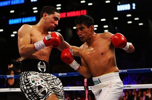 Unbeaten Danny Garcia, left, stopped Erik Morales with a powerful left hook in the fourth round