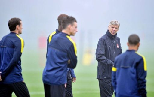 Wenger defends Arsenal's 15-minute flight