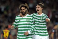 Celtic's Georgios Samaras (L) and Mikael Lustig celebrate a goal