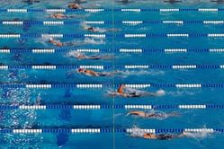 Banned US swim coach charged with child abuse