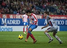 Falcao on target as Atletico stay on Barca trail
