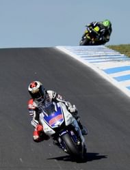 Yamaha rider Jorge Lorenzo of Spain leads Cal Crutchlow of Great Britain over Lukey Heights