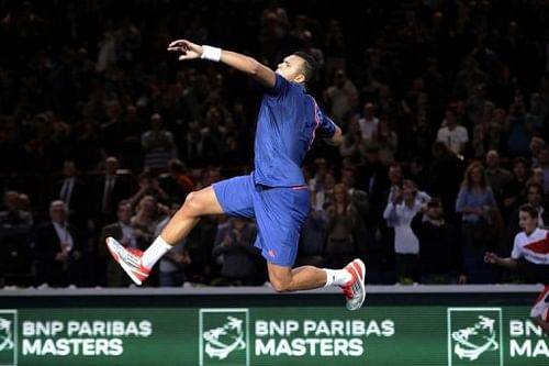 Jo-Wilfried Tsonga celebrates after winning