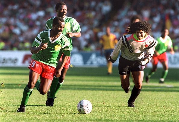 Cameroon's Roger Milla, 1990  Roger milla, World football, Vintage  football shirts